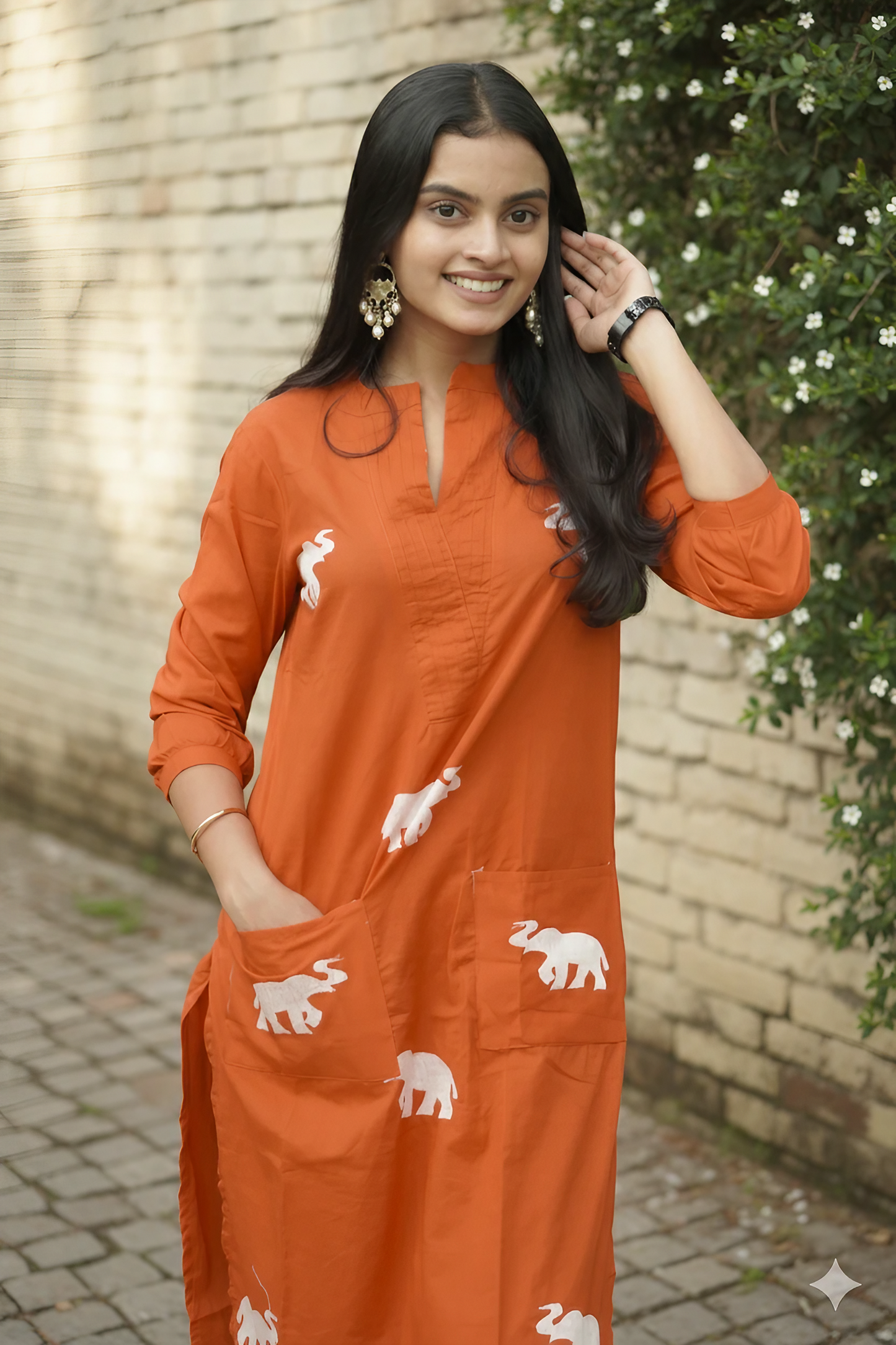 Orange Kurta Set With White Elephant Embroidery Design