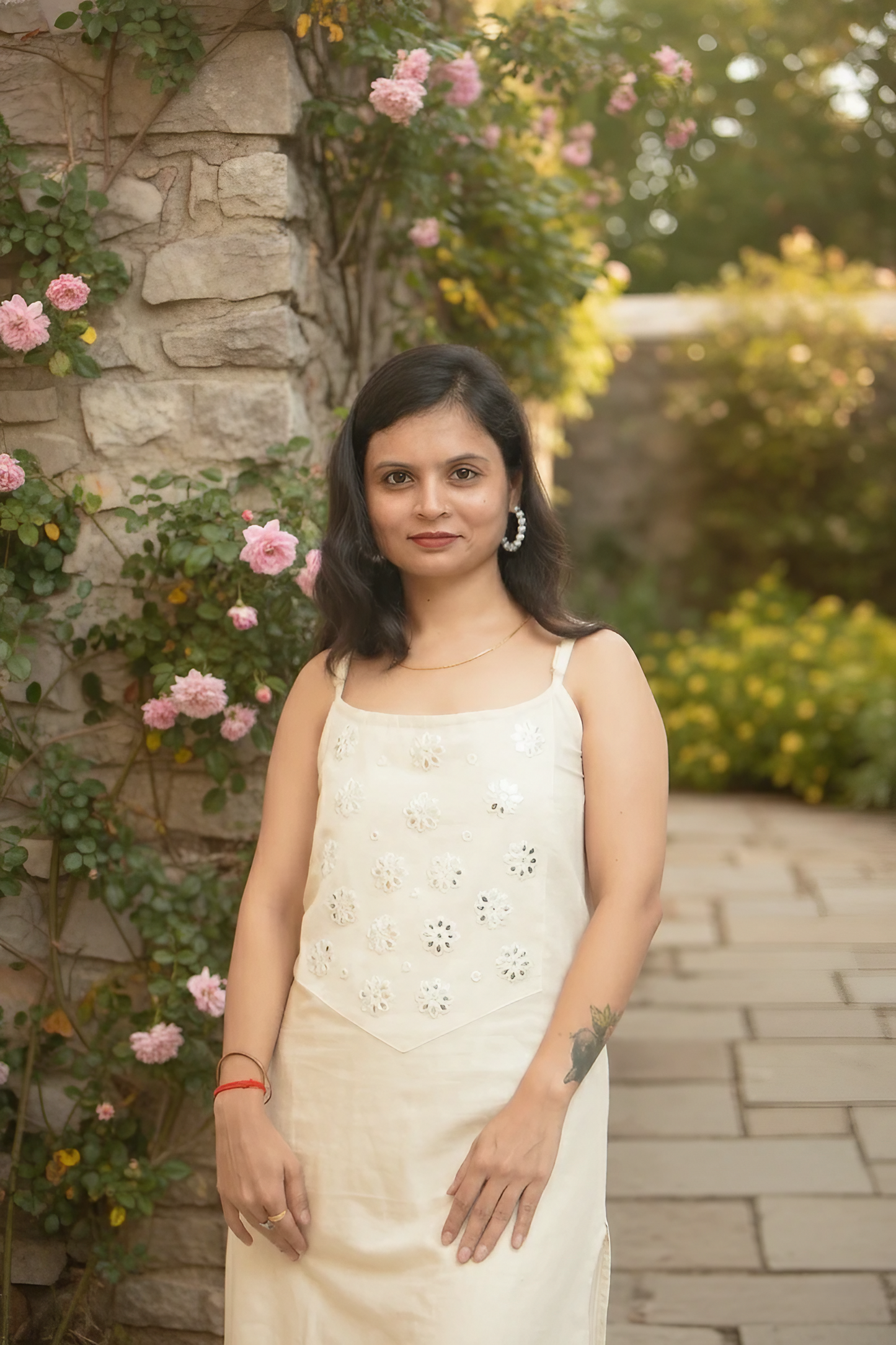 Modern Sleeveless Linen Kurta Set With Traditional Mirror Work.