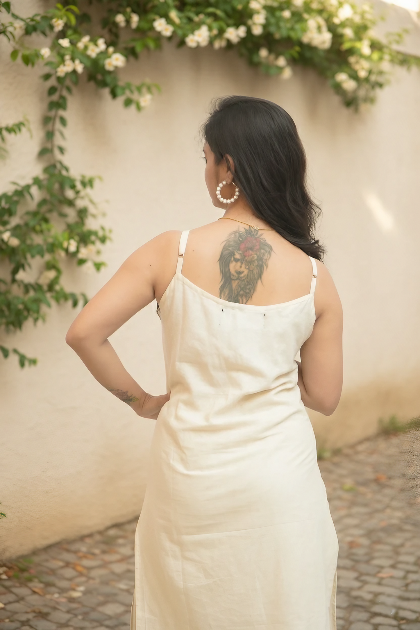 Modern Sleeveless Linen Kurta Set With Traditional Mirror Work.